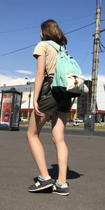 Cute Dorky Girl in Shorts with Thin Muscular Legs Street Candid Photos