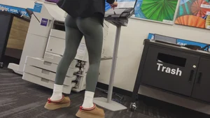 Green Lululemons Bent Over at Fedex