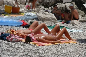 Nude girls on a beach in Hvar, Croatia