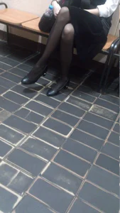 Crossed Skinny Legs of a Candid College Girl in a Long Skirt And Black Pantyhose College Creepshot