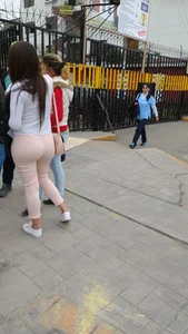 Big booty brunette babe in tight pink pants