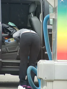Girls cleaning their cars in jeans and pants