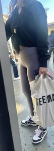 Sexy girl in grey leggings showing ass and cameltoe