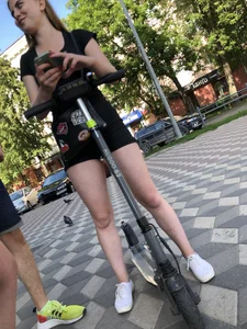 Chubby Teen in Shorts with a Scooter on the Street Candid Pics