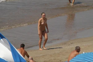 Girls on a nude beach in Sitges, Spain