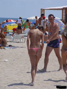Beach voyeur girls in bikinis, thongs and topless