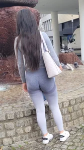 Gorgeous candid MILF wearing grey leggings on the street