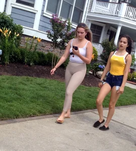 Couple teens walking in shorts and leggings