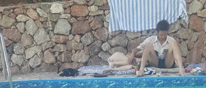 Very skinny girl by the pool
