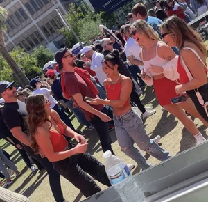 Hot college girls at football game (cheeks everywhere)