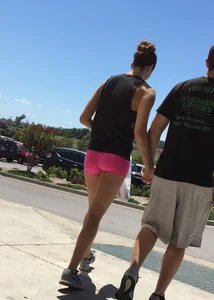 Sexy girl with a nice ass in tight pink spandex shorts