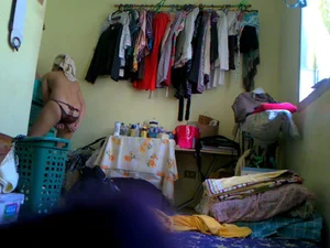Hidden camera pics of a petite Asian in her room changing