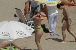 Girls on a nude beach in Sitges, Spain