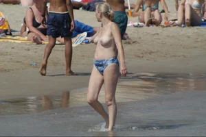 Girls on a nude beach in Sitges, Spain