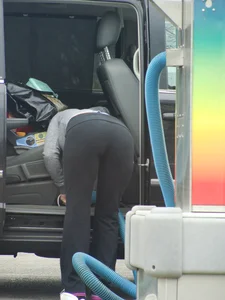 Girls cleaning their cars in jeans and pants