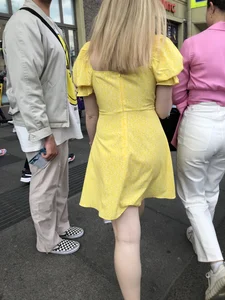 Hot blonde candid chick wearing a yellow dress street creepshots