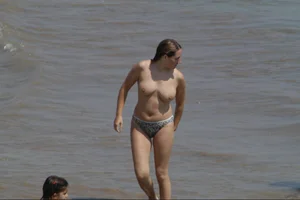 Girls on a nude beach in Sitges, Spain