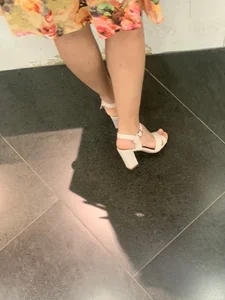 Candid closeups of female feet in public places and otherwise
