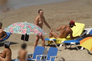 Girls on a nude beach in Sitges, Spain