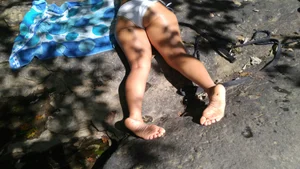 Sexy bikini ass laying out on the rocks up close