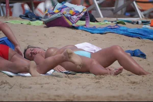 Girls on a nude beach in Bibione, Italy