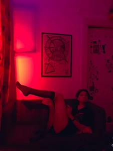 Sexy Girl in Knee-Socks Lying on a Couch Home Creepshot