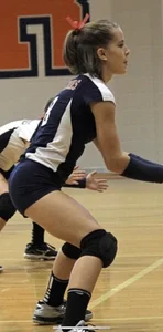 Teen girls playing volleyball
