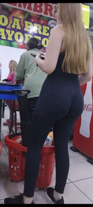 Blonde girl in a black bodysuit with an incredible body and perfect ass [OC]