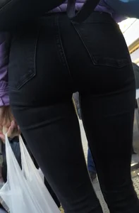 Juicy ass in black tight jeans and nice skinny legs street closeups