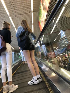 Hot Girls on the Mall Travelator in Mini Shorts and Her Friend in White Pants - Skinny Hot Legs Creepshots