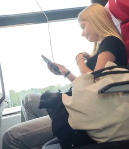 Hot busty blonde on train