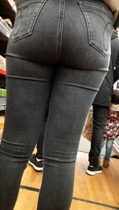 Teen in tight jeans shopping