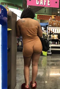 Latina with hard nipples and a big booty in tight spandex shorts outfit
