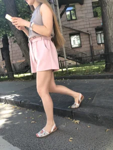 Cute candid girl in pink shorts street photos