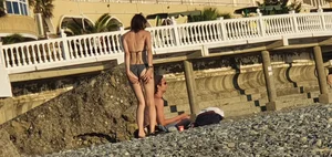 Hot Candid Girl in a Swimsuit Chilling on a Beach With Her Boyfriend Creepshots Series