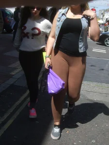 Thick blonde showing her panties in see through leggings
