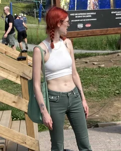 A Group of Teens Street Photos, a Tall Glasses-Wearing Red-Headed Teen in a Top With Nice Abs