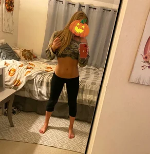 Girl in Leggings Pulling Up Sweater Flashing Flat Tummy Home Mirror Selfie