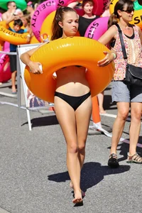 Beautiful and sexy tubing teen in bikini with a sexy friend