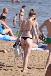 Girl in Swimsuit on the Beach Candid Photo