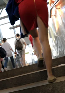 Long Legs Under a Short Skirt on the Stairs Creepshots