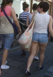 Daisy dukes candid girl showing her ass cheeks
