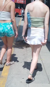 Two pretty blondes, short shorts, nice legs, (laughing)