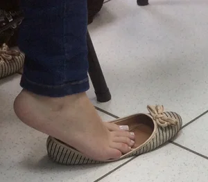 Girl’s Bare Foot With a Flat Taken Off College Creepshot