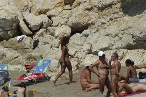 Girls on a nude beach in Sitges, Spain