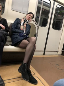 Tall Girl With Awesome Long Legs in Black Pantyhose Asleep in the Subway Train With Crossed Legs, Then Standing on the Escalator With Widely Spread Legs Hot Creepshots Gallery