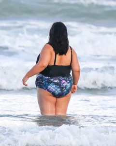 Extra thick girl at the beach in a bikini