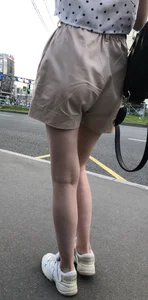 Cute Girl in a Blouse and Shorts With Thin Legs Bus Stop Candid Photo Gallery
