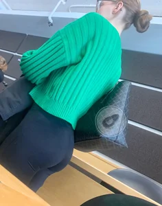 College Girl in Green Sweater and Leggings