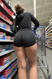 Latina with slight VPL in shorts- OC
